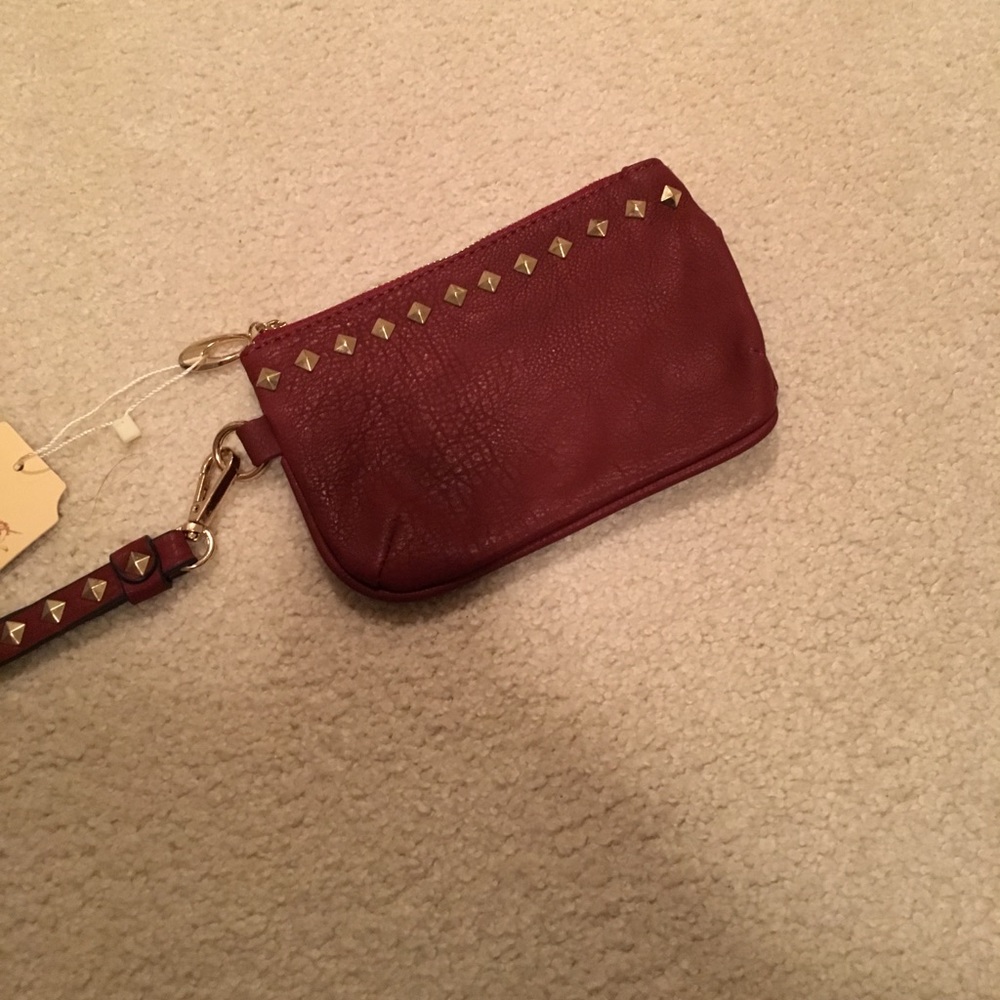 Studded burgundy wristlet